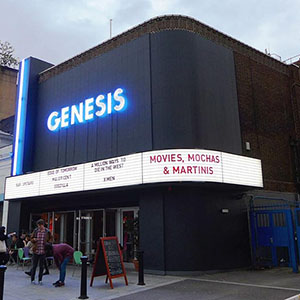 Genesis Cinema building after, a new and sleek look, a dark building exterior Genesis Cinema building after, a new and sleek look, a dark building exterior