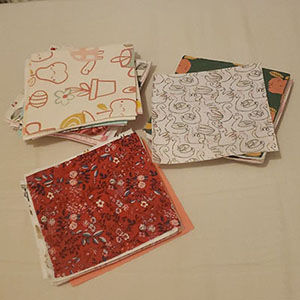 baby clothes cut into squares