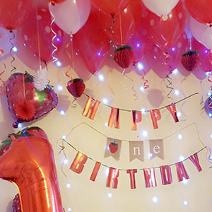 baby sister's firth birthday strawberry themed decorations