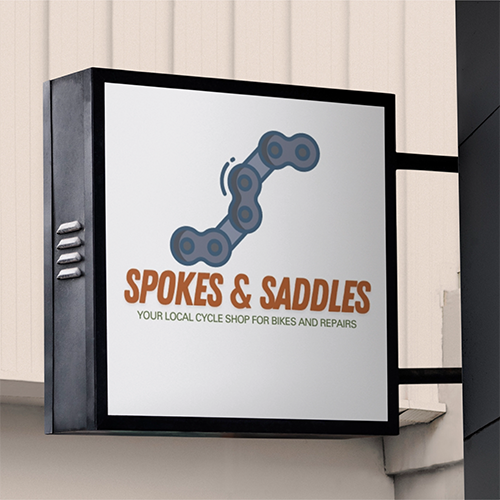 Spokes and Saddles logo on a mock up signage board